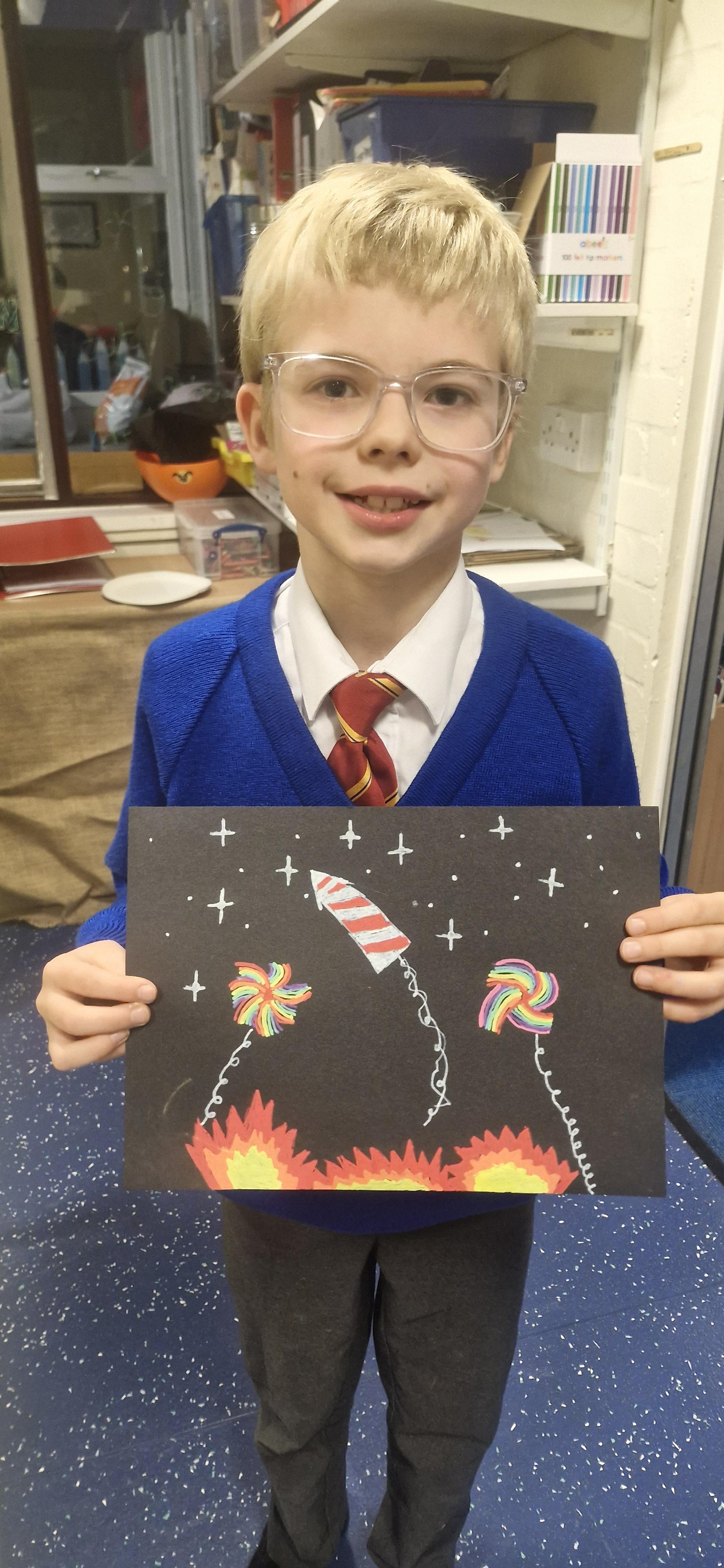 We created our own fireworks and bonfires using paint markers and tissue paper